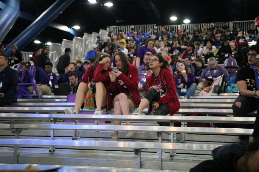 From left to right: Juniors Maya Terplan, Erne Mccabe and Elizabeth Karas anticipate the results of the FIRST Robotics Championship in Houston, Texas.