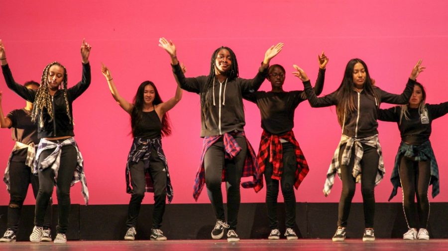 Junior Mina Arnold (center) and the rest of BSU performing a dance on May 25 at Multicultural Night in the Carol Channing Theater.