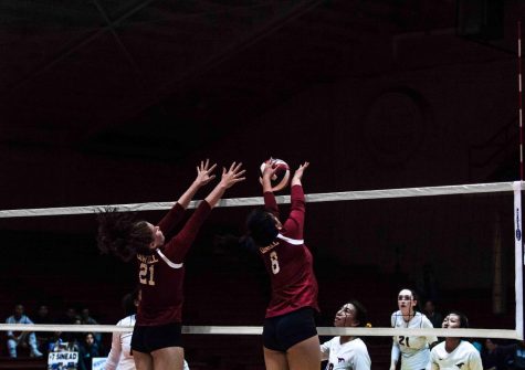 Sophomore middle blocker Kenedi Edmunds (left) and senior right-side hitter Betsy Li (right) put up a solid, well-formed block during the AAA Girls Volleyball Championship on Nov. 2 at Kezar,