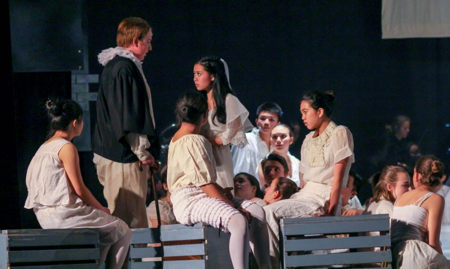Senior Joseph Guenther, as Judge Turpin, eyes his  adopted daughter. Johanna.  Madison Chan, as Johanna,  looks in disgust.