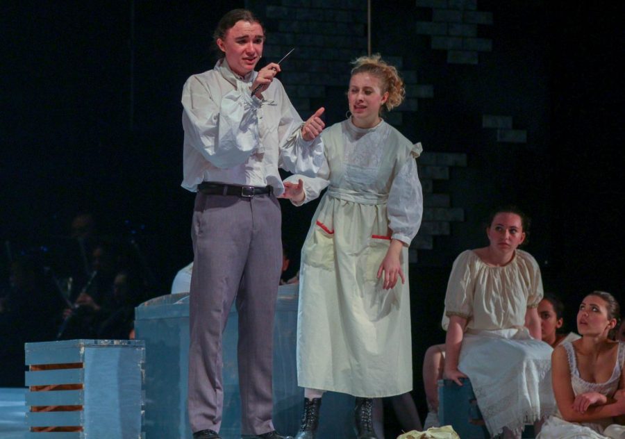 Sweeney Todd, played by junior Ariel Anderson, breaks down as his first attempt to kill Judge Turpin is ruined.  Senior Samantha Rich, as Mrs. Lovett, attempts to soothe his anger.