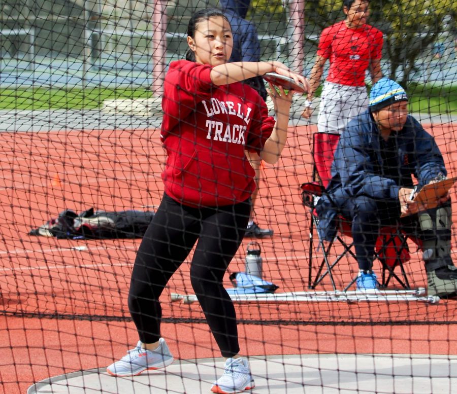 Junior thrower Alexandria Singer gets ready to throw the discus.
