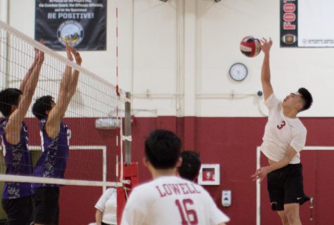 Junior right side hitter George Pan confronts the Galileo Lions with a furious spike on Mar. 20 at home. 