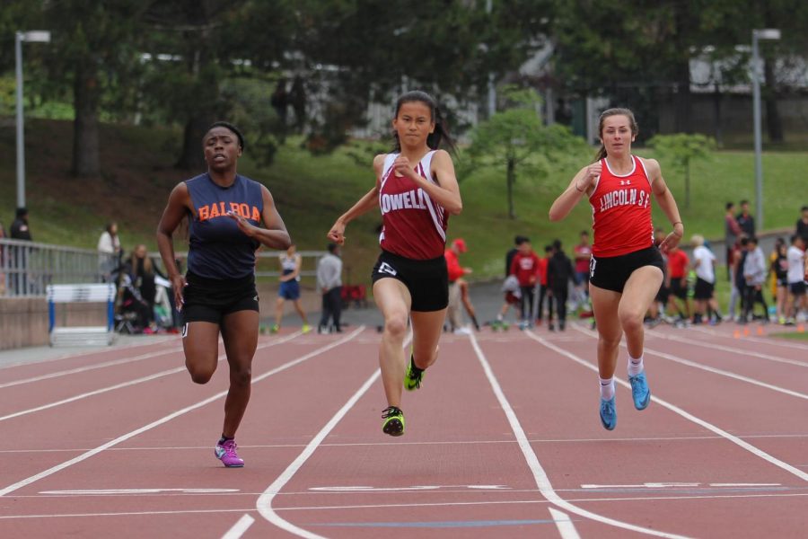 Senior Emily Liu wins first with a time of 12.88 in the varsity girls 100m dash.