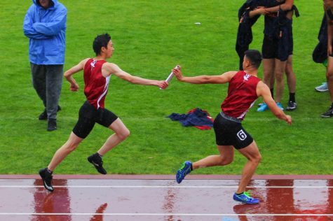 Lowell track reigns through the rain to claim AAA overall team championship