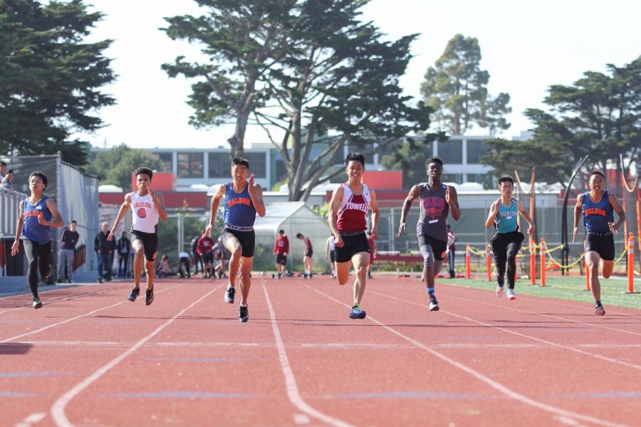 Senior sprinter Jovin Cheung wins the varsity boys 100m dash with a time of 11.16, .15 seconds faster than the next time.